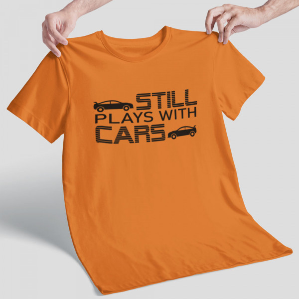 T-shirt "Still plays with cars"