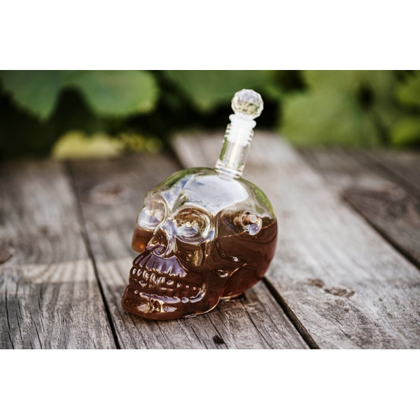 Skull-shaped carafe with bullet