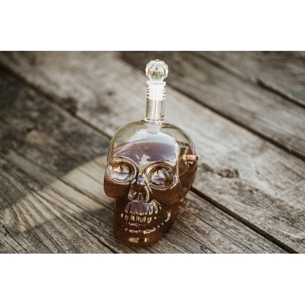Skull-shaped carafe with bullet