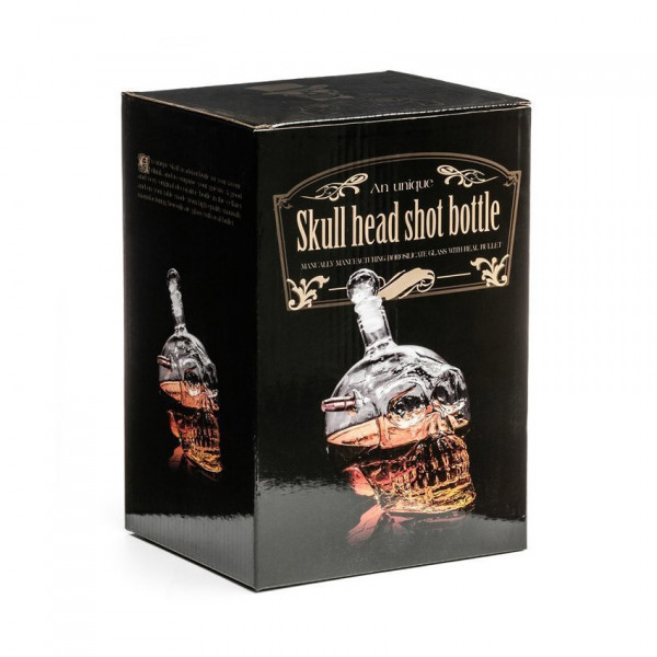 Skull-shaped carafe with bullet