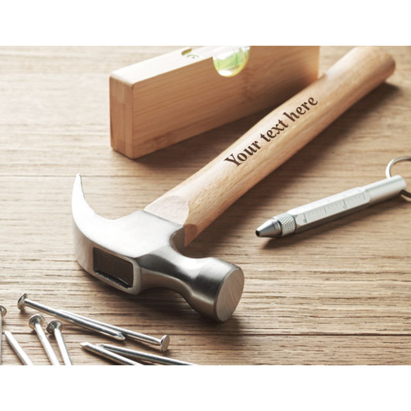 Hammer with a wooden handle with your own text Hammer with a wooden handle with your own text